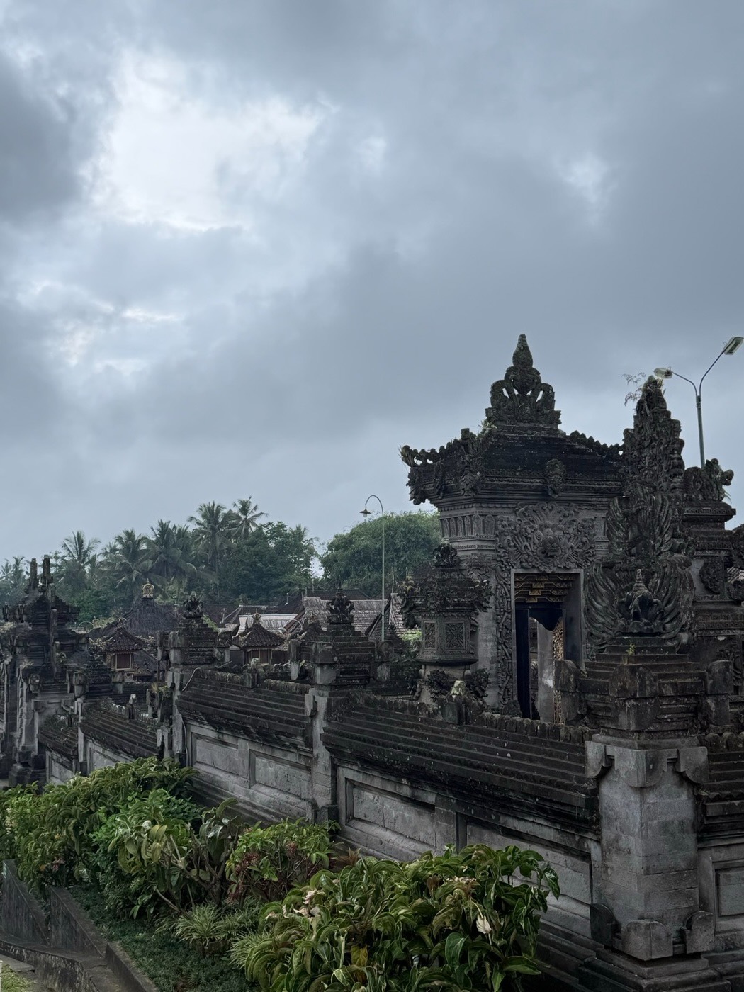 Penglipuran village, Bangli. Carved family gates in the traditional village